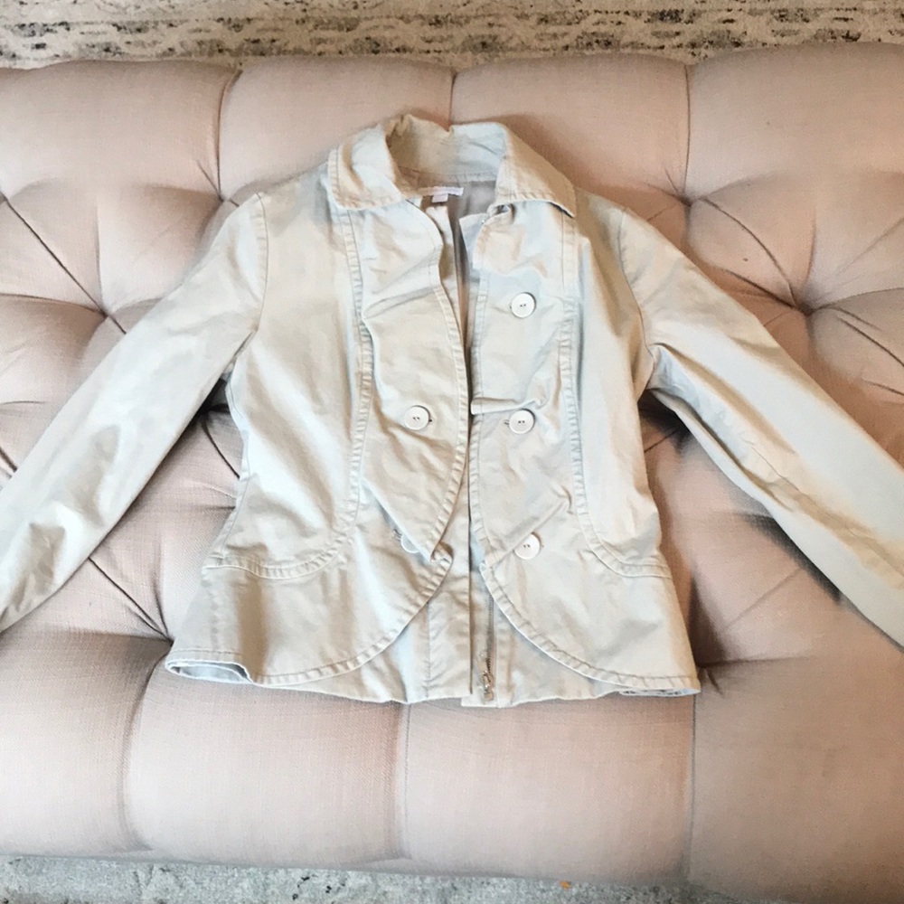 Jacket with zipper and buttons.